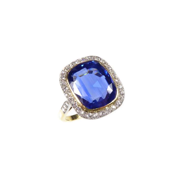 Single stone cushion cut sapphire and diamond cluster ring